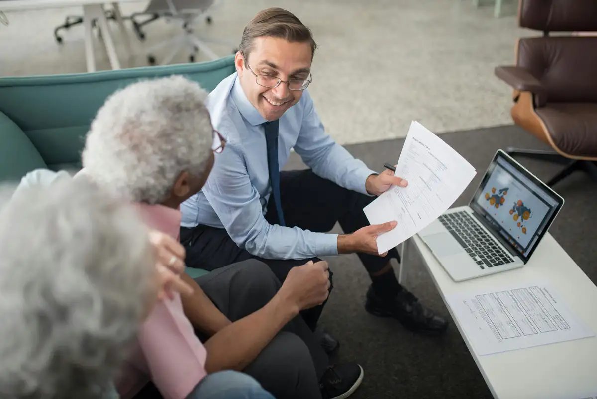 Image of Three People at a Meeting